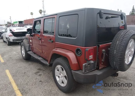 2007 Jeep Wrangler Unlimited Sahara z USA, uszkodzony, nr VIN 1J4GA59147L155674